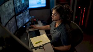 Security operator reviewing live camera footage