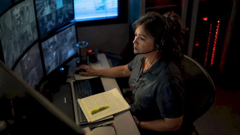 Security operator reviewing live camera footage