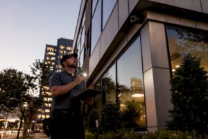 Security technician surveying commercial site