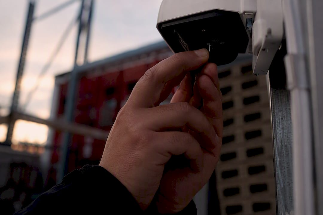 Technician disabling camera audio recording