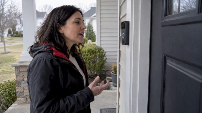 Homeowner speaking through door camera