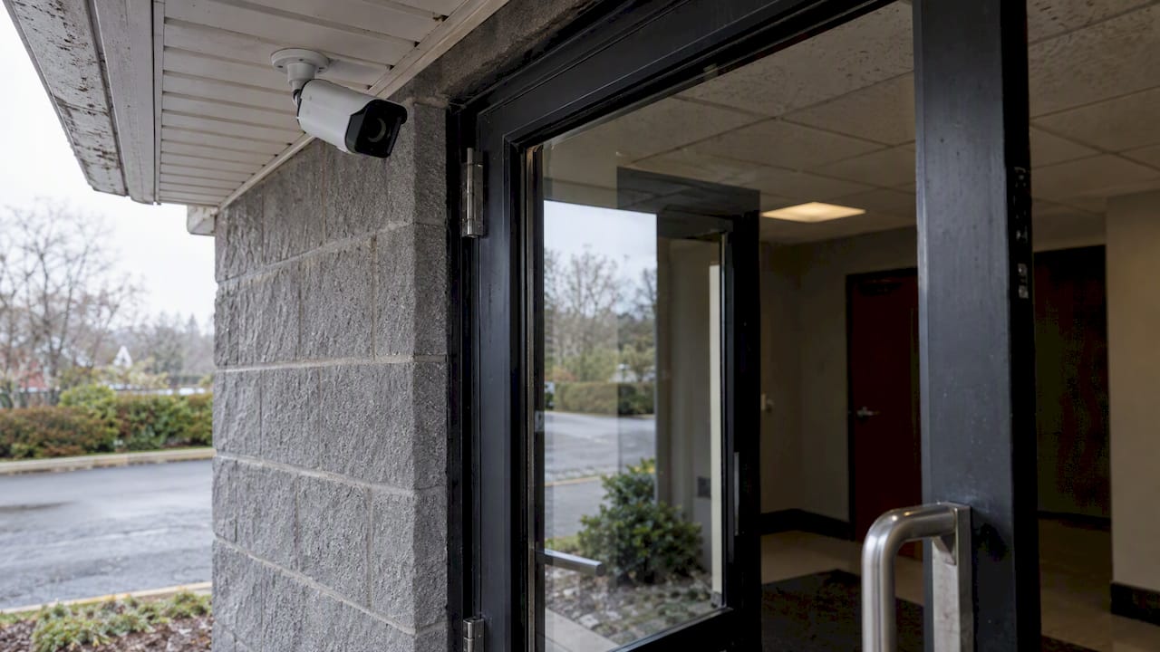 Camera overlooking a bright commercial entrance