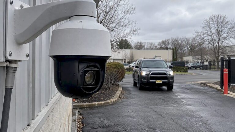 PTZ security camera aimed toward a vehicle plate