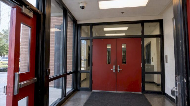 Security camera above a school entrance